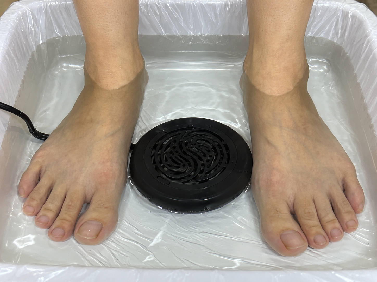 Foot bath with clear water